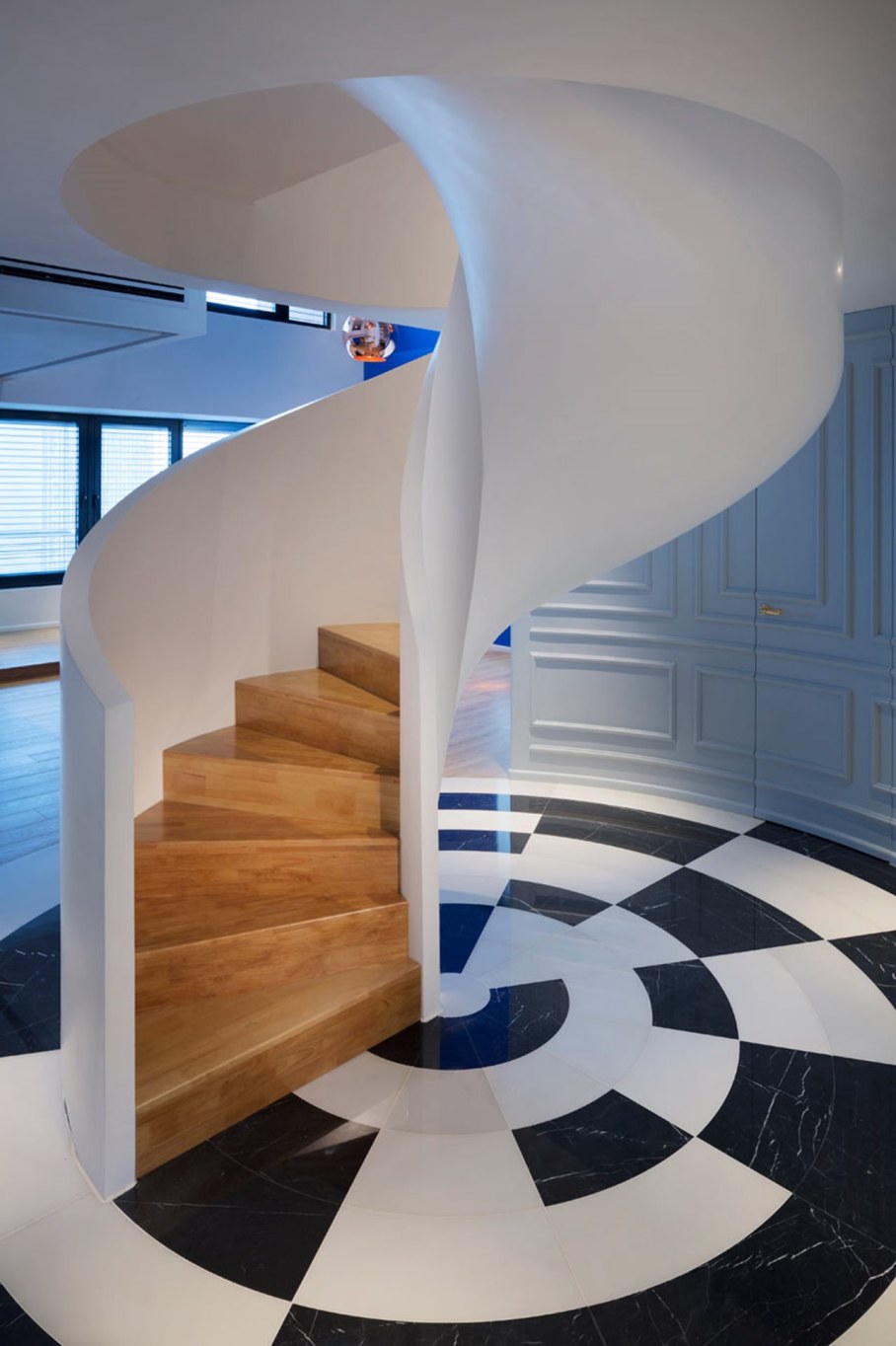 Blue Penthouse - Sculptural spiral staircase