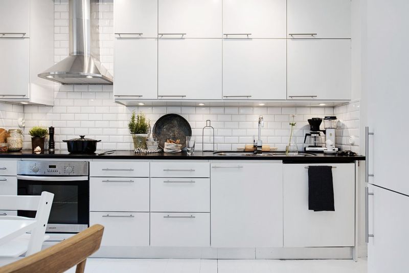 Kitchen and dining area in the Black and White style