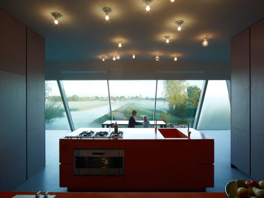 The House Of Unusual Shape From VMX Architects - Kitchen island