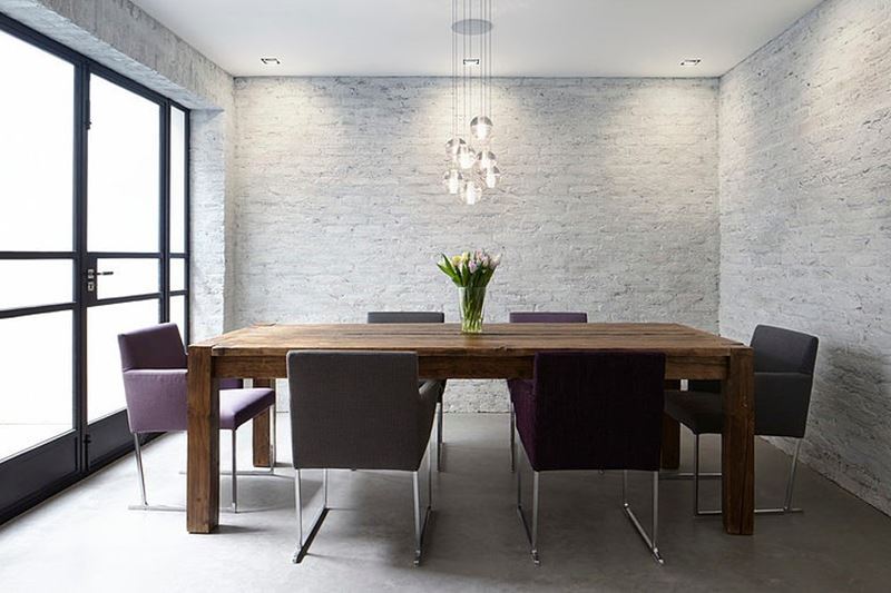Stylish design of the three-storeyed residence in London - The dining table it is made in a form of coarse cottage-styled item