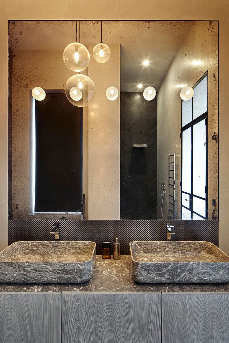 Stylish design of the three-storeyed residence in London - bathroom - There is also a wash-basin for two unusual-shaped sinks, a shower and a wall hung toilet here