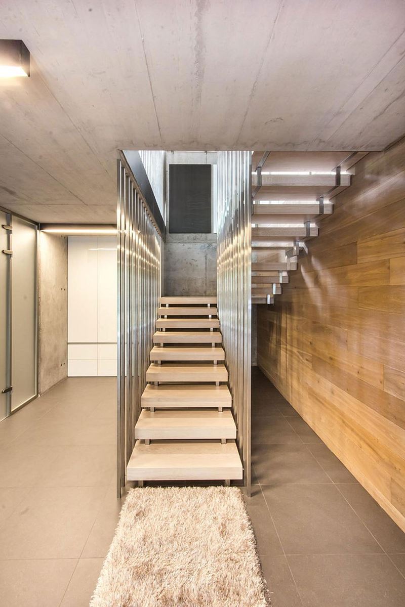 This modern three-story house - staircase to the second floor