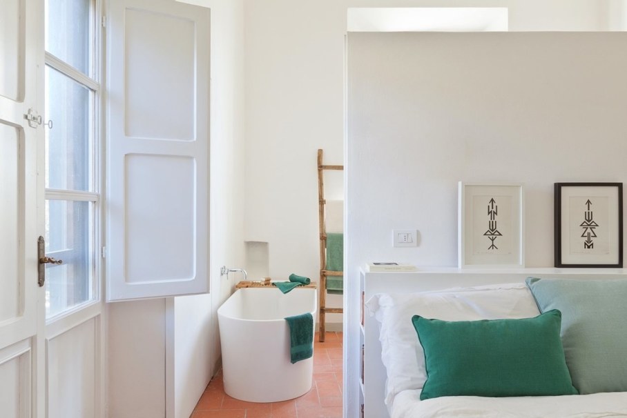 Renovation Of The Former Monastery Building in Tuscany - bedroom and bathroom