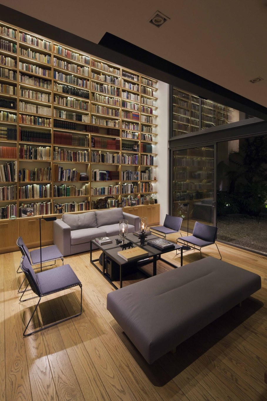 Four Patio House in Mexico by Andres Stebelski arquitecto - Living room with library