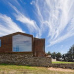 Plinth house by Land Arquitectos in Chile