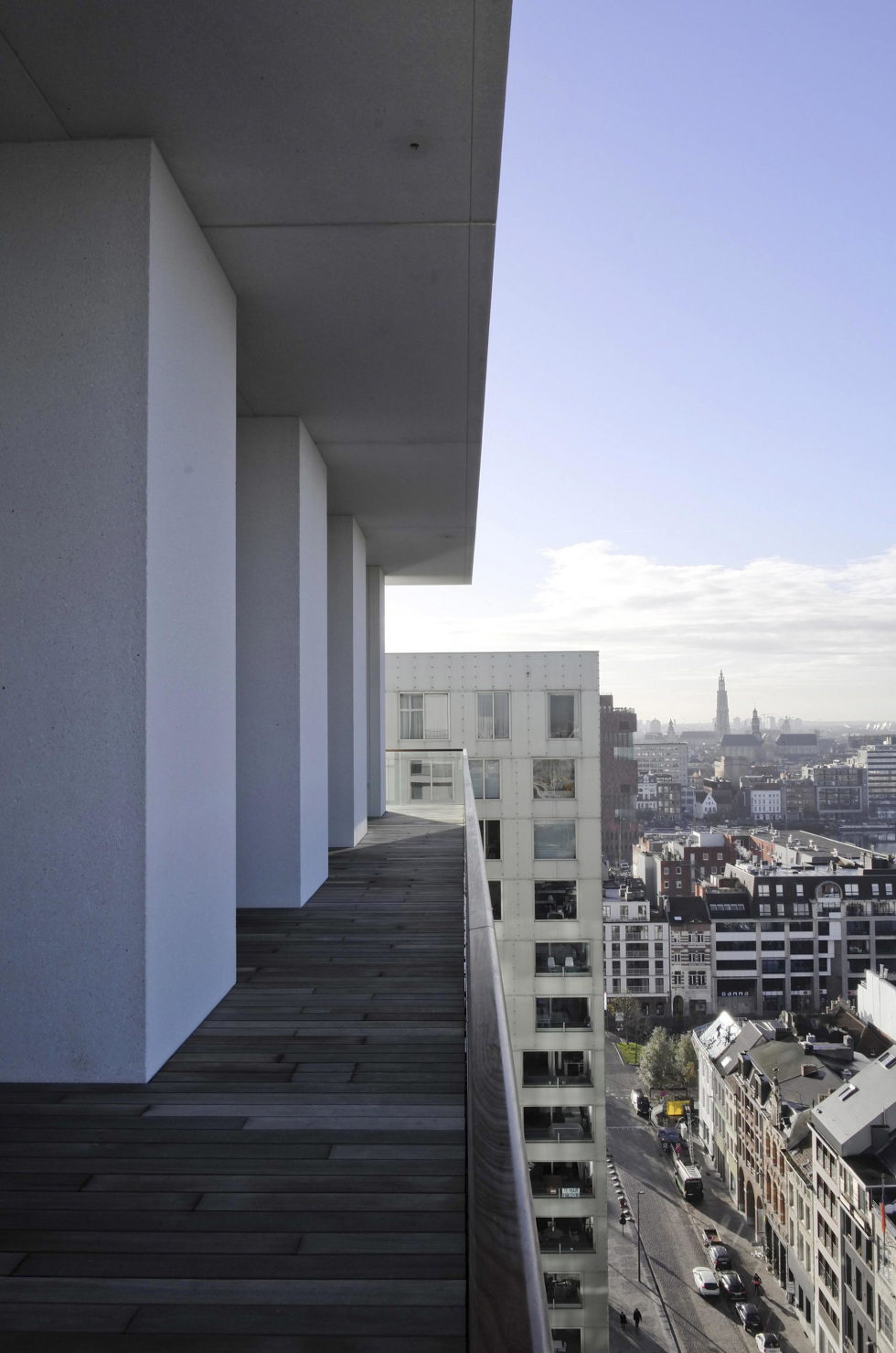 Stone and Wood in The Interior of The Penthouse In Belgium 16