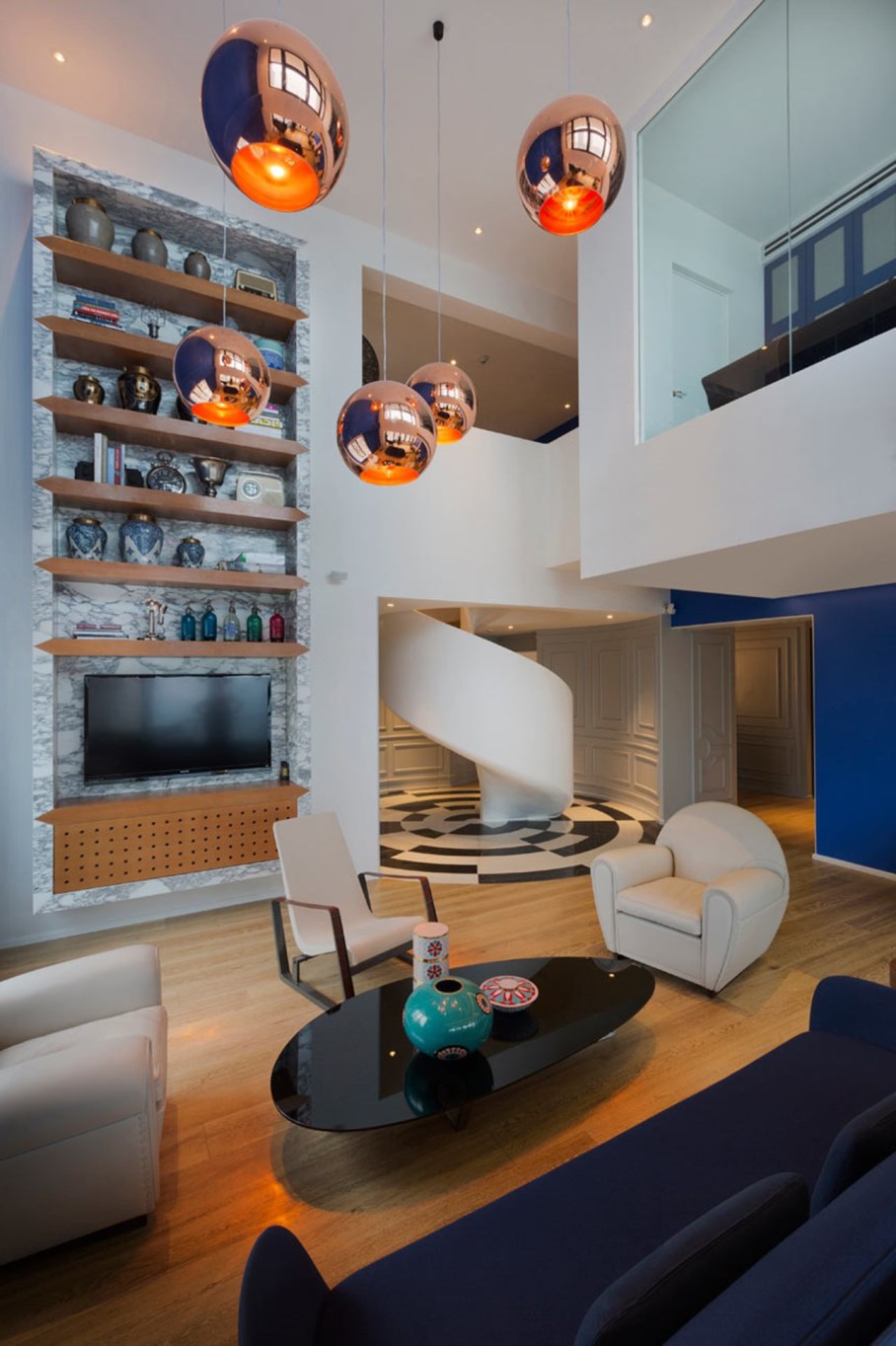 Blue Penthouse Living room with spiral staircase