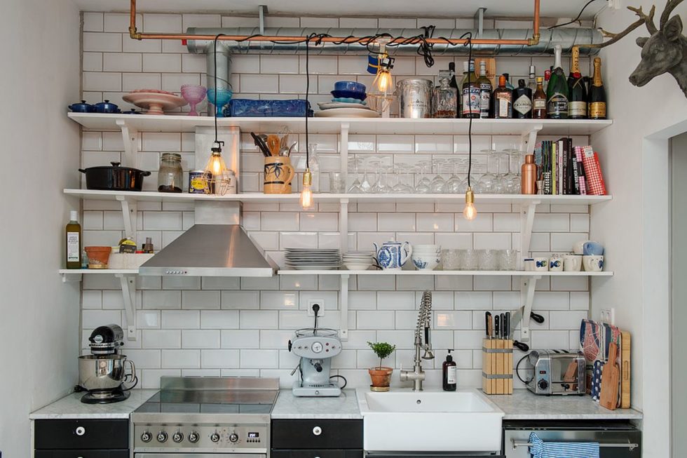 Small Swedish Apartment - White shelves provide space for all crockery