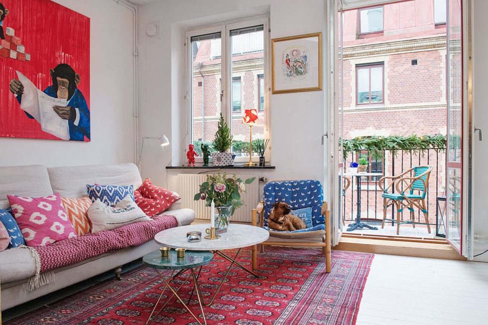 Small Swedish Apartment - a small balcony overlooking a quiet street