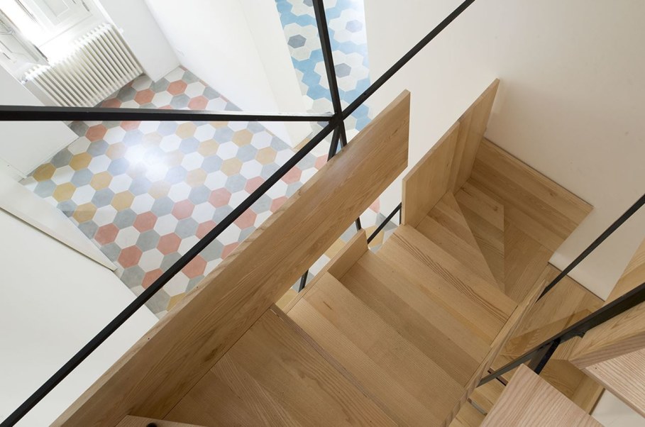 The Stylish Staircase Made of Metal Framework and Wooden Panels 3