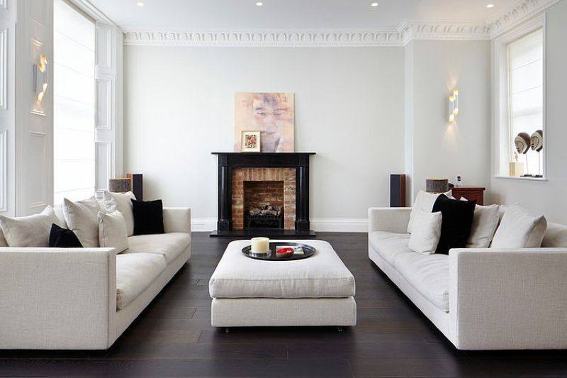 Stylish design of the three-storeyed residence in London - There are two commodious sofas near the fireplace