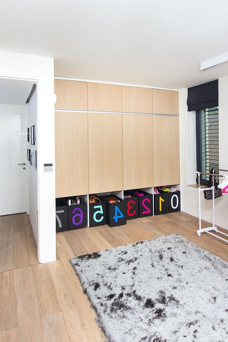 This modern three-story house - room for children - Numerous toys are carefully put into the lockers