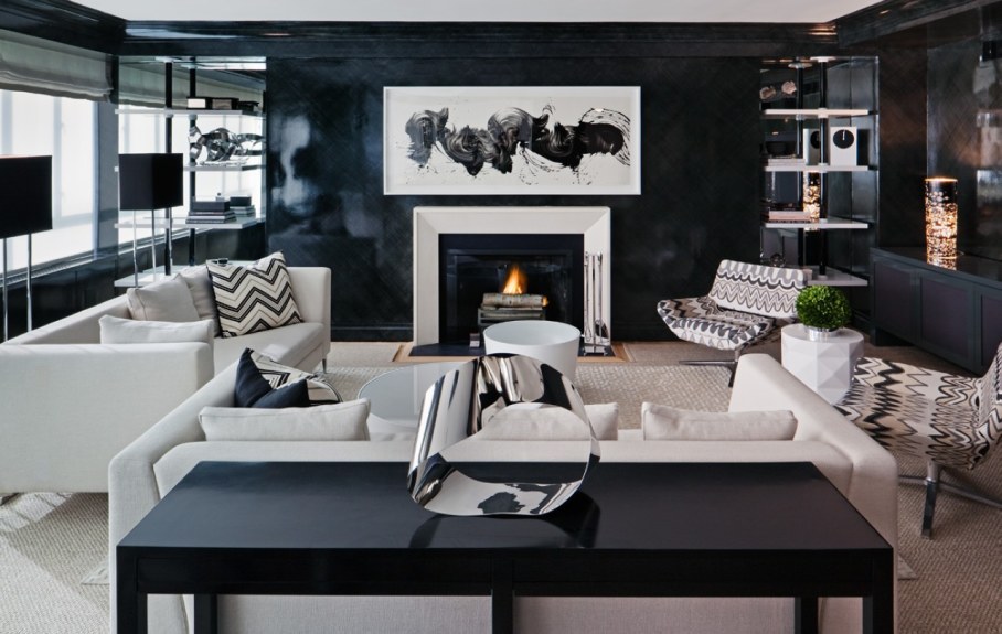 Decorate the zone around the fireplace with prints in frames