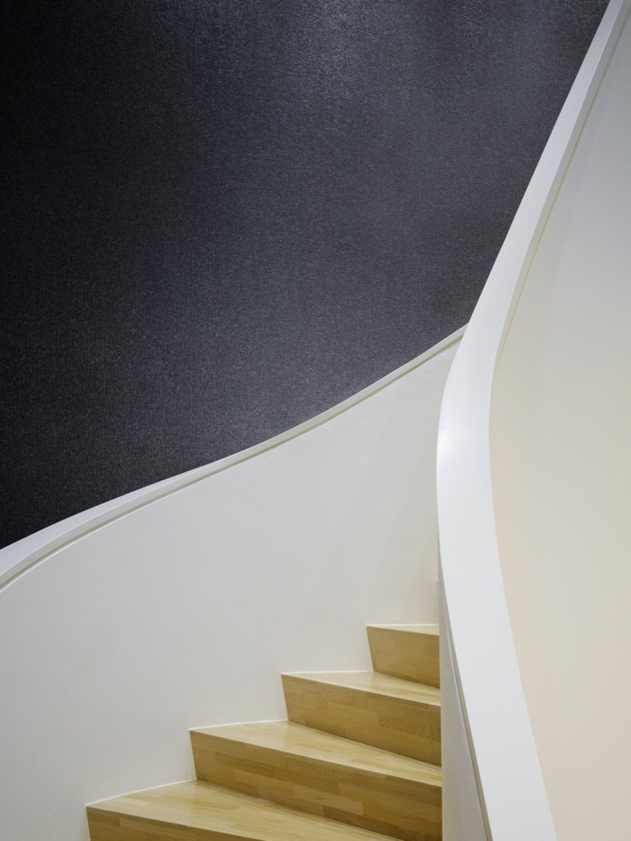 Elegant interior design - curved staircase to the second floor