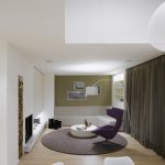 Elegant interior design: a duplex apartment with a fireplace in the QUANT complex