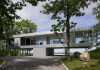 Glass Clearhouse by Stuart Parr Design on the lake bank